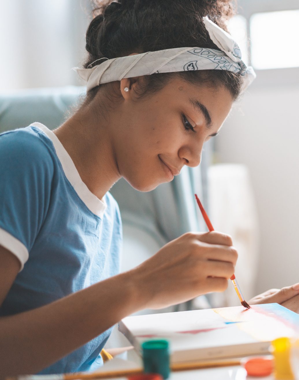 A teenager in a private telehealth therapy session at home
